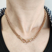 Load image into Gallery viewer, A rose gold curb link Albert chain with two lobster clasps, modelled on a neck
