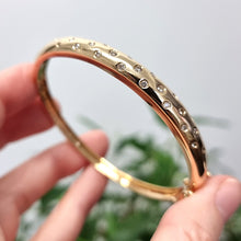 Load image into Gallery viewer, Vintage 18ct Gold Brilliant Cut Diamond Hinged Bangle in hand