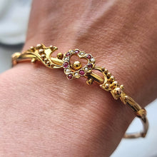 Load image into Gallery viewer, Antique 9ct Gold Ruby and Seed Pearl Heart Bangle modelled