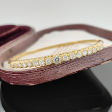 Load image into Gallery viewer, A yellow gold diamond bangle bracelet, in an antique box