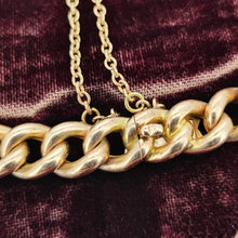 Load image into Gallery viewer, A rose gold curb link bracelet, with a safety chain, in an antique box