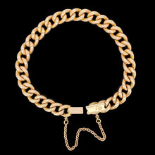 Load image into Gallery viewer, A rose gold curb link bracelet, with a safety chain, on a black background