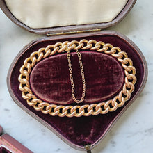 Load image into Gallery viewer, A rose gold curb link bracelet, with a safety chain, in an antique box
