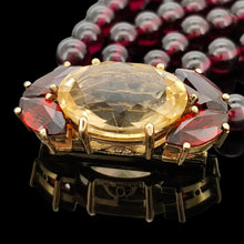 Load image into Gallery viewer, A five row round garnet bead bracelet with a citrine and garnet clasp in yellow gold