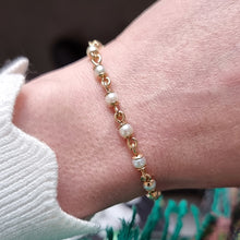 Load image into Gallery viewer, Vintage 9ct Yellow Gold Pearl Bracelet modelled
