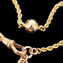 Load image into Gallery viewer, Antique 9ct Yellow Gold Fancy Rope Bracelet with T-Bar, close-up of the faceted bead, on a black background