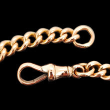 Load image into Gallery viewer, A rose gold curb link bracelet, on a black background