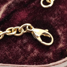 Load image into Gallery viewer, A yellow gold lobster claw clasp