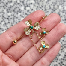 Load image into Gallery viewer, Antique 9ct Gold Turquoise Clover Bar Brooch in hand