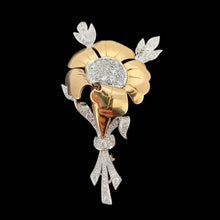 Load image into Gallery viewer, A two tone gold flower brooch with diamonds, on a black background
