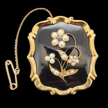 Load image into Gallery viewer, A black onyx, pearl and diamond flower brooch in yellow gold