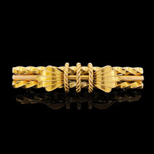 Load image into Gallery viewer, A yellow gold twist and rope design bar brooch, on a black background