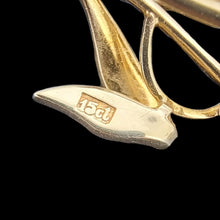 Load image into Gallery viewer, Gold brooch with '15ct' stamp on a black background