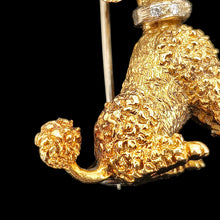 Load image into Gallery viewer, A yellow gold poodle dog brooch with a diamond set collar, on a black background