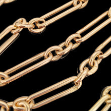 Load image into Gallery viewer, A gold trombone link chain necklace with a lobster claw clasp