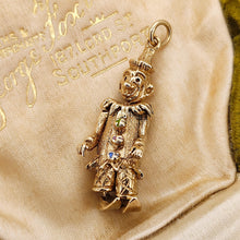 Load image into Gallery viewer, An articulated clown charm in yellow gold with coloured enamel buttons, in an antique box