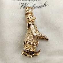 Load image into Gallery viewer, An articulated clown charm in yellow gold with coloured enamel buttons