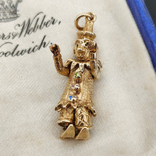 Load image into Gallery viewer, An articulated clown charm in yellow gold with coloured enamel buttons, in an antique box