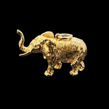 Load image into Gallery viewer, Large Vintage 9ct Yellow Gold Elephant Charm/Pendant facing left, on a black background