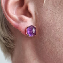 Load image into Gallery viewer, 9ct Gold Cabochon Amethyst Stud Earrings modelled