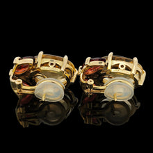 Load image into Gallery viewer, A pair of oval citrine and marquise garnet earrings in yellow gold