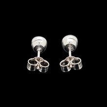 Load image into Gallery viewer, Pair of platinum earrings on a black background