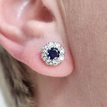 Load image into Gallery viewer, 18ct White Gold Sapphire and Diamond Cluster Stud Earrings modelled in the ear
