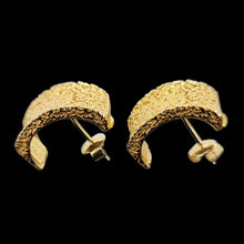 Load image into Gallery viewer, Nicolis Cola 18ct Yellow Gold Textured Half Hoop Earrings side view, on a black background