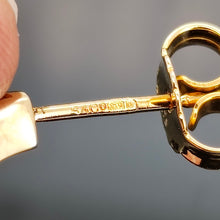 Load image into Gallery viewer, Close-up of a 9 carat gold hallmark on a yellow gold earring post