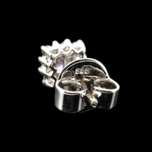 Load image into Gallery viewer, A white gold earring with a butterfly stamped 585, on a black background