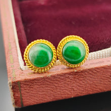 Load image into Gallery viewer, A pair of round jade stud earrings in yellow gold, in an antique box