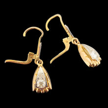 Load image into Gallery viewer, A pair of yellow and white gold diamond set drop earrings, on a black background