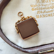 Load image into Gallery viewer, A carnelian swivel fob in yellow gold, in an antique box