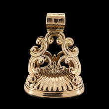Load image into Gallery viewer, A yellow gold fob seal, on a black background