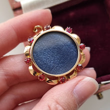Load image into Gallery viewer, Vintage 9ct Gold Ruby Open Faced Locket in hand