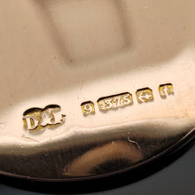 Load image into Gallery viewer, Close-up of a 9 carat gold Birmingham 1918 hallmark with a D&F maker's stamp on a yellow gold locket