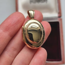 Load image into Gallery viewer, Vintage 9ct Yellow Gold Oval Locket, Hallmarked Birmingham 1997 in hand