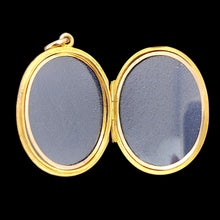 Load image into Gallery viewer, An oval yellow gold locket pendant, open