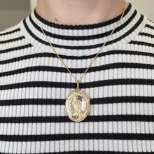 Load image into Gallery viewer, Antique 9ct Gold Back & Front Ornate Horseshoe Locket modelled with chain
