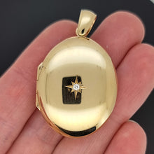 Load image into Gallery viewer, Vintage 9ct Yellow Gold Diamond Oval Locket in hand