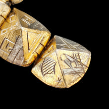 Load image into Gallery viewer, A folding masonic ball fob pendant in gold and silver, on a black background