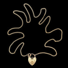 Load image into Gallery viewer, Gold chain necklace with a heart-shaped padlock pendant on a black background