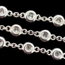 Load image into Gallery viewer, A white gold round diamond station necklace, close-up
