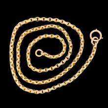 Load image into Gallery viewer, A yellow gold faceted link chain necklace, on a black background