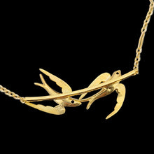Load image into Gallery viewer, A yellow gold pendant necklace featuring two swallow birds in flight