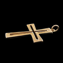 Load image into Gallery viewer, A yellow gold cutout design cross pendant, on a black background