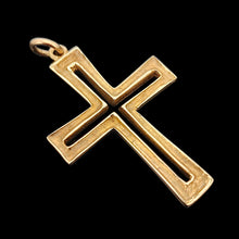 Load image into Gallery viewer, A yellow gold cutout design cross pendant, on a black background