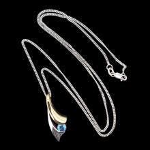 Load image into Gallery viewer, 9ct Yellow and White Gold Aquamarine Pendant with curb link chain, on a black background