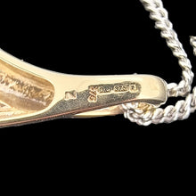 Load image into Gallery viewer, 9ct Yellow and White Gold Aquamarine Pendant close-up of hallmark, with curb link chain, on a black background