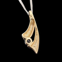 Load image into Gallery viewer, 9ct Yellow and White Gold Aquamarine Pendant reverse view, with curb link chain, on a black background